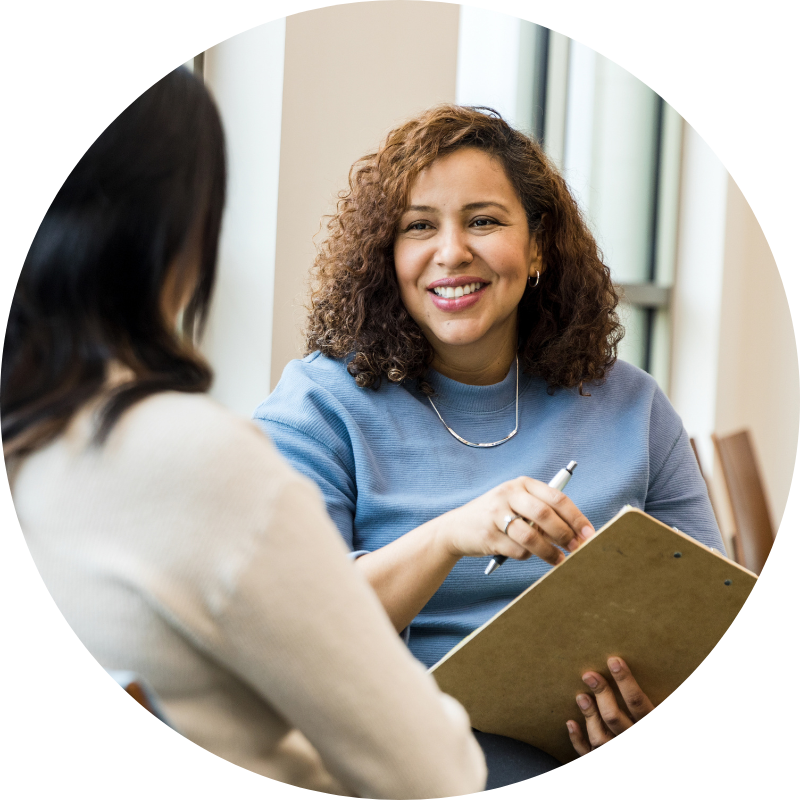 A photo of a career advisor and program participant